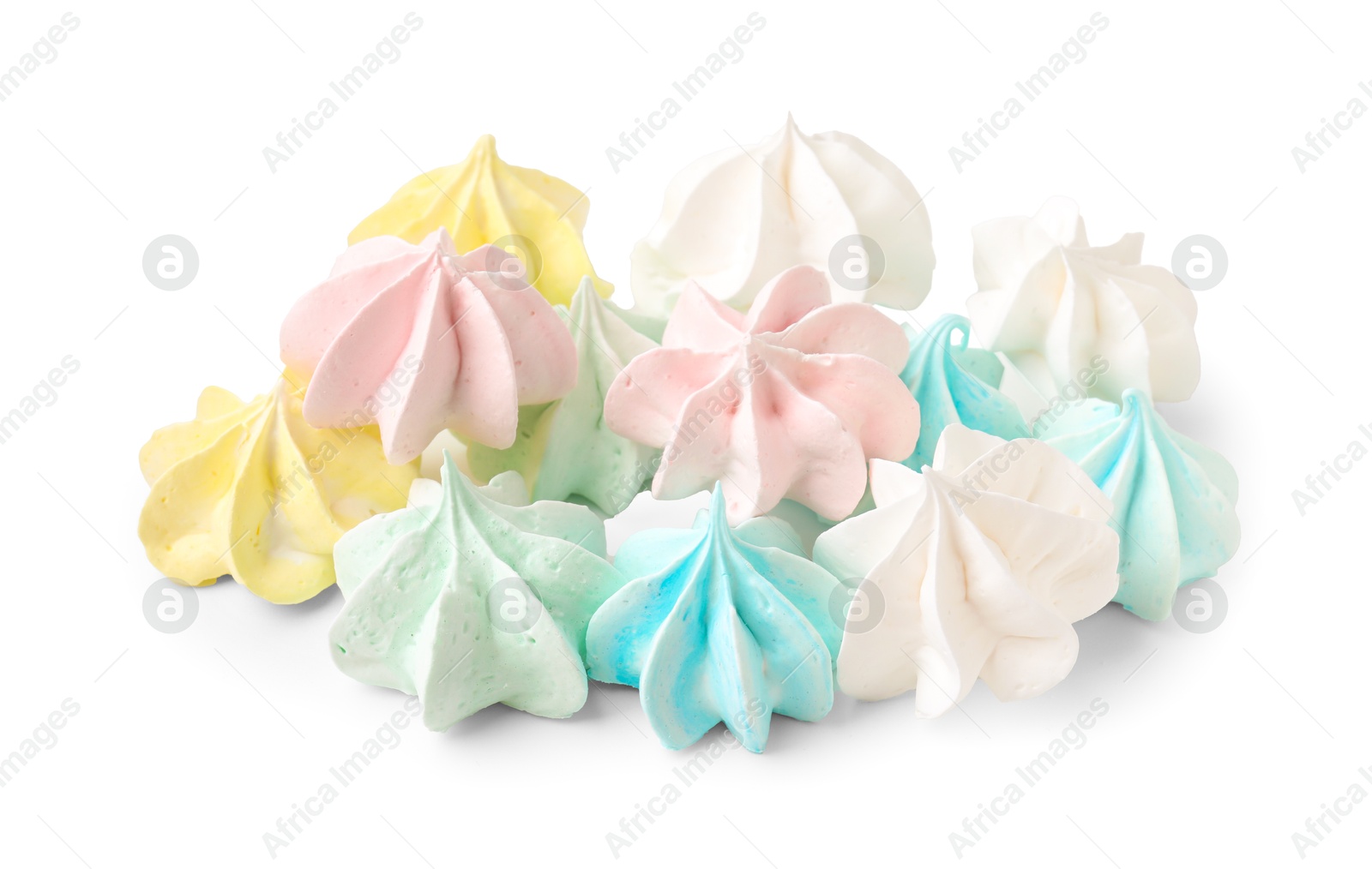 Photo of Many delicious meringue cookies isolated on white