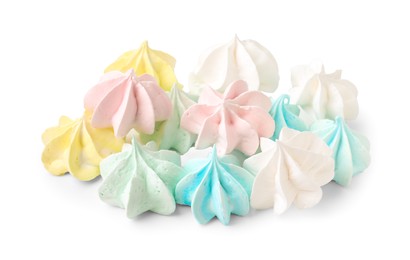 Photo of Many delicious meringue cookies isolated on white