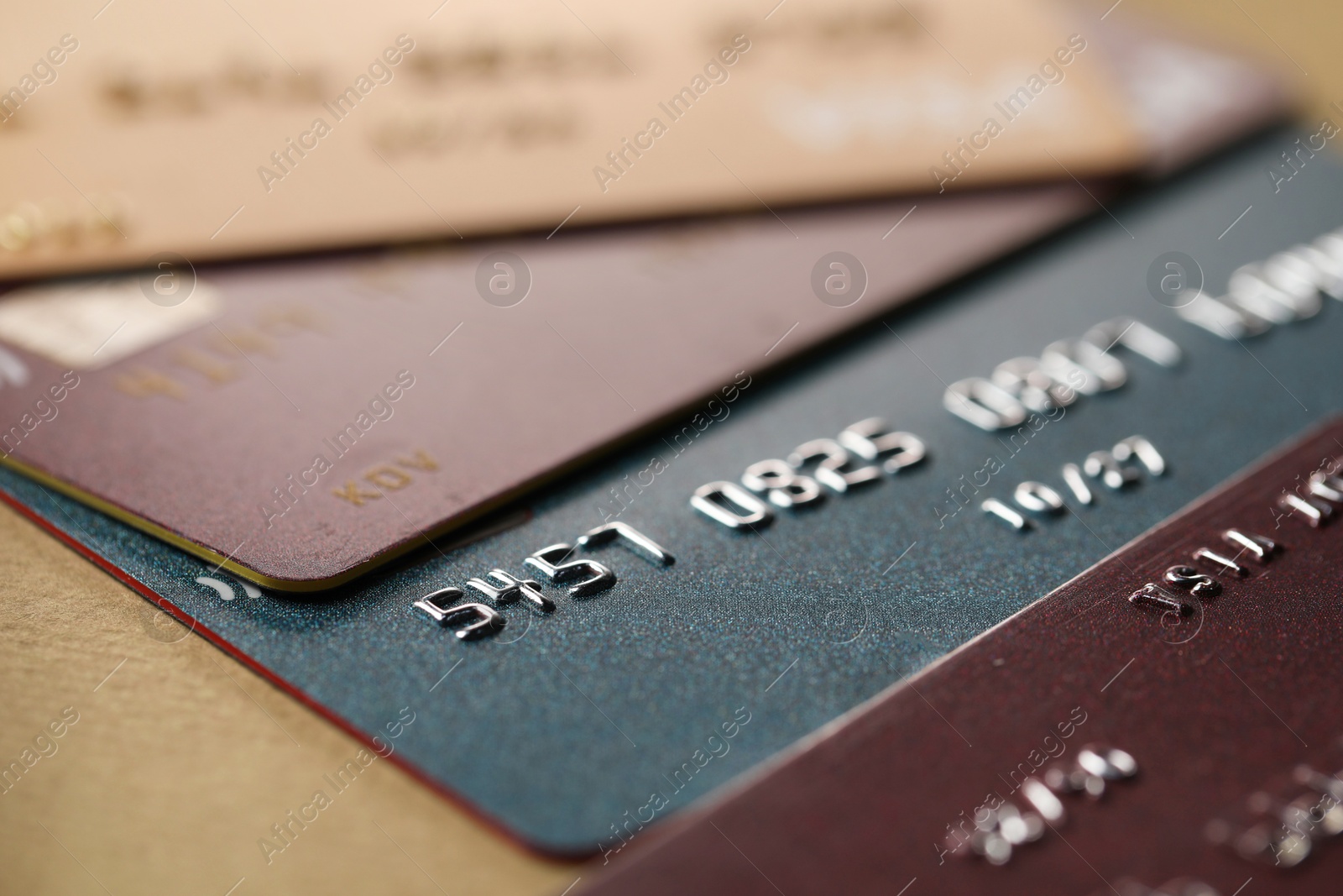 Photo of Different credit cards on table, macro view