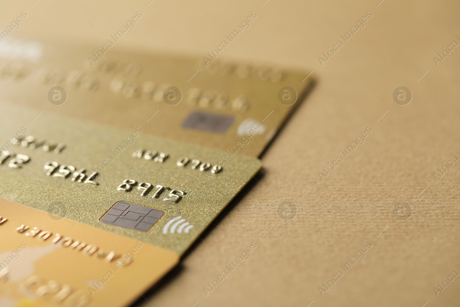 Photo of Different credit cards on table, closeup view. Space for text