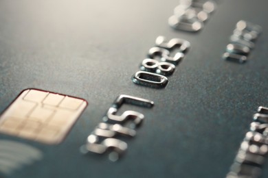 Plastic credit card as background, macro view