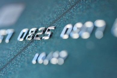 Photo of One credit card as background, macro view