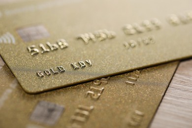 Two credit cards on table, macro view