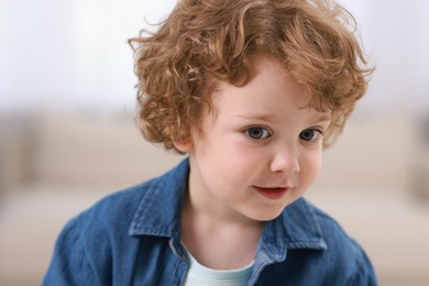 Photo of Portrait of little boy indoors. Cute child