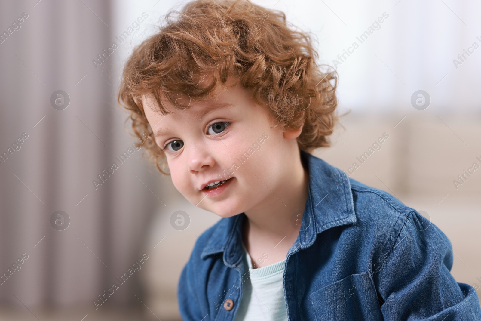 Photo of Portrait of little boy indoors. Cute child