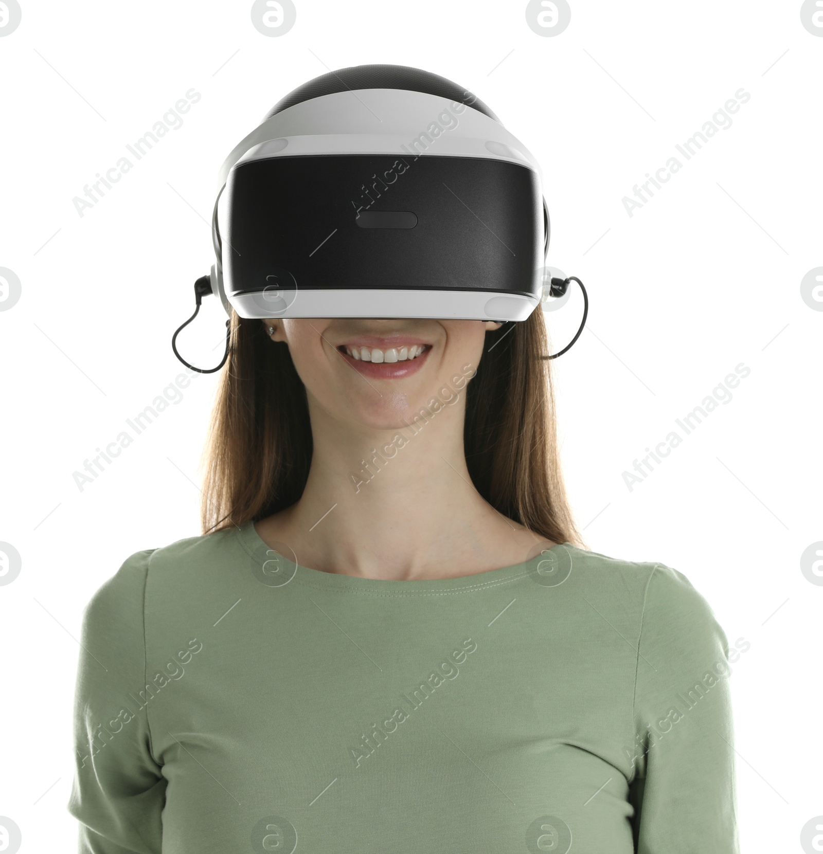 Photo of Smiling woman using virtual reality headset on white background