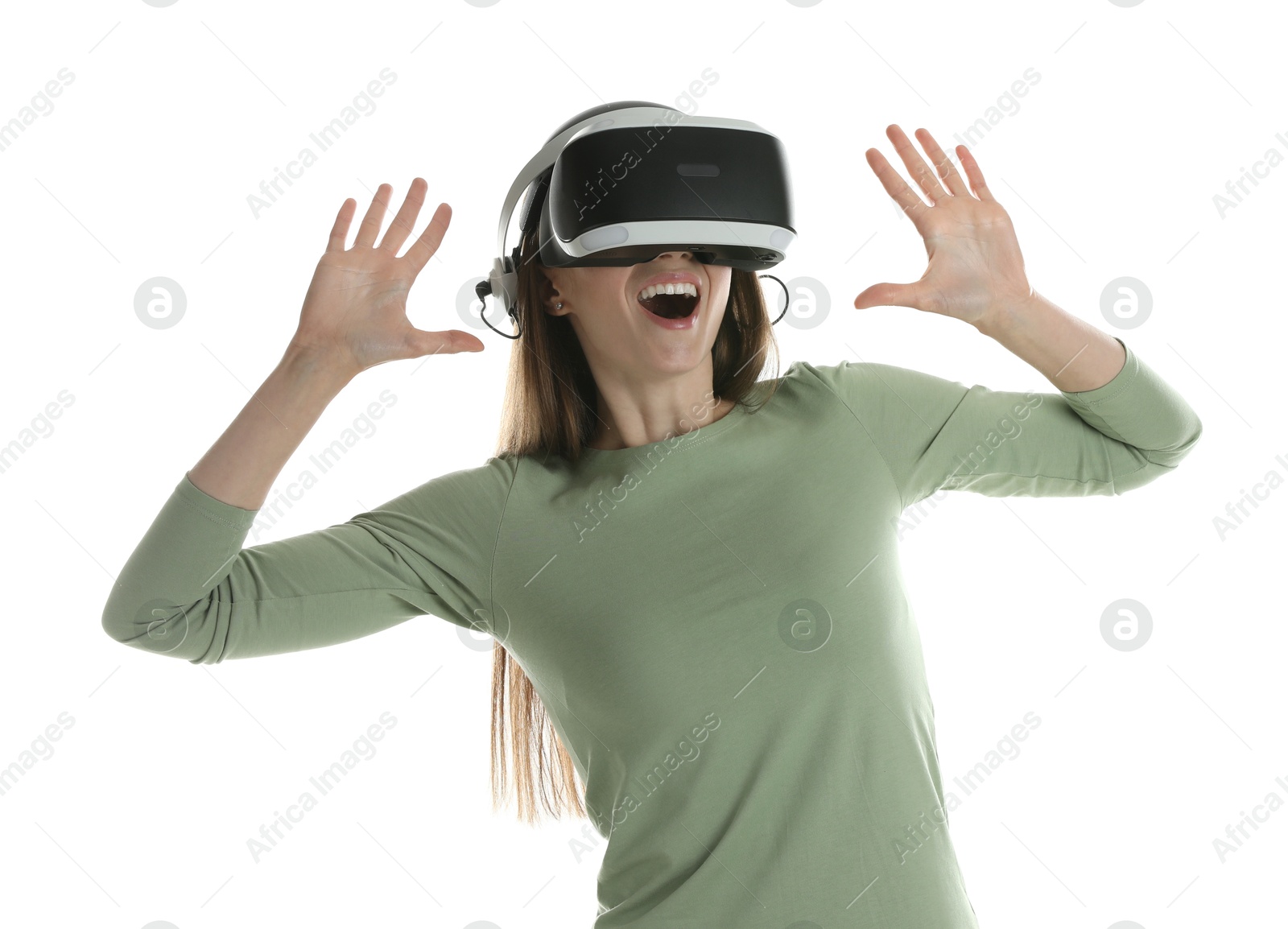 Photo of Surprised woman using virtual reality headset on white background