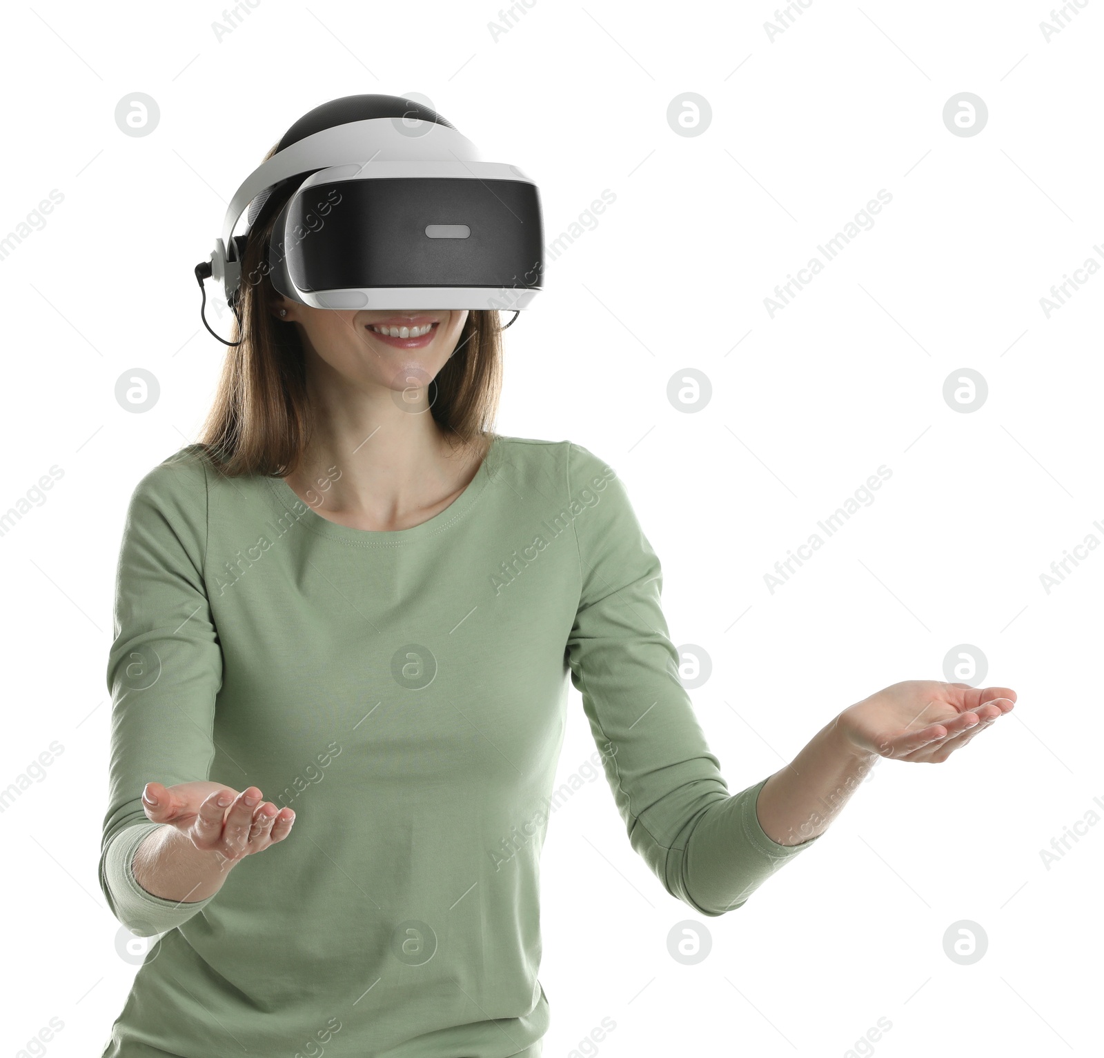 Photo of Smiling woman using virtual reality headset on white background