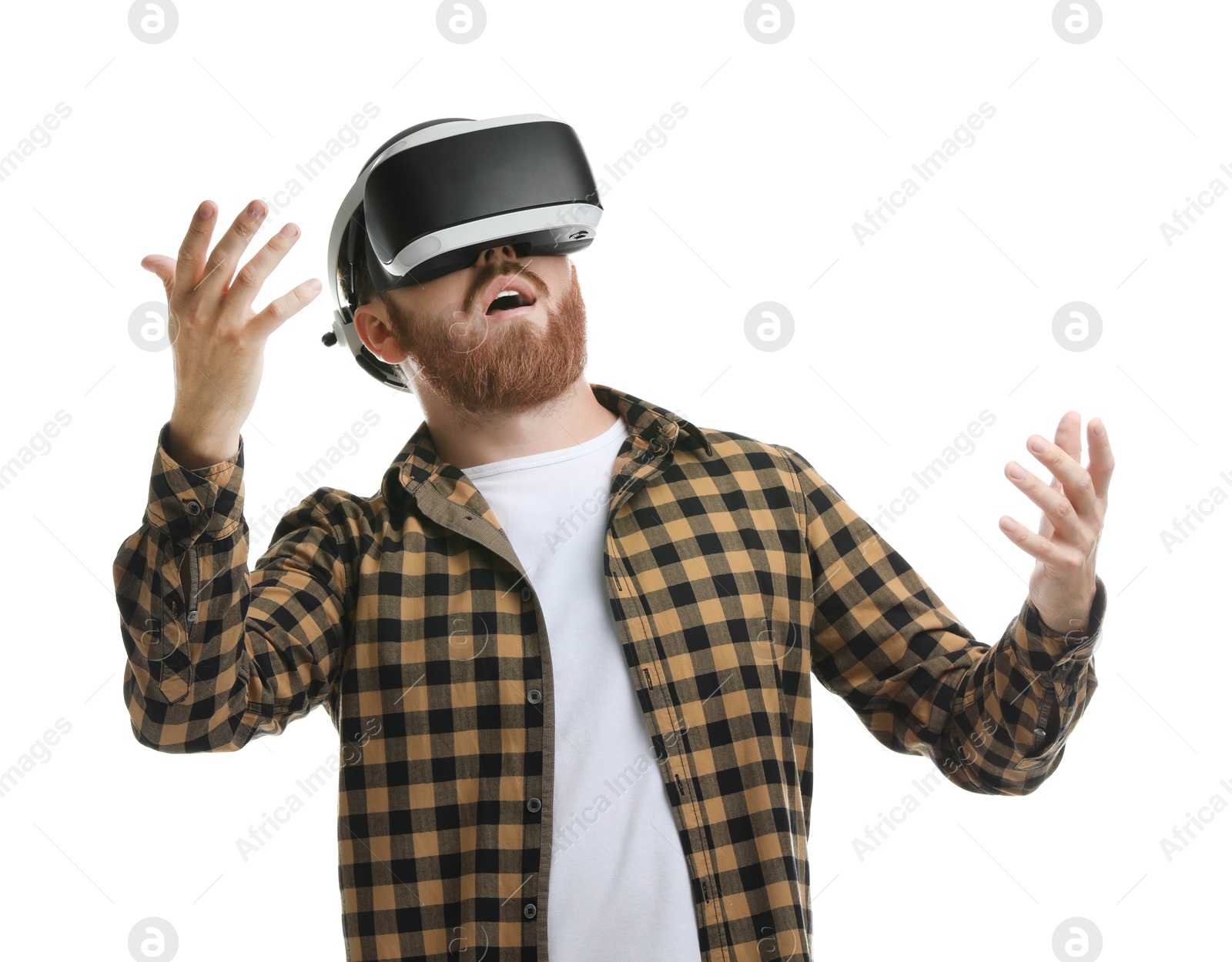 Photo of Surprised man using virtual reality headset on white background