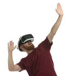 Photo of Emotional man using virtual reality headset on white background