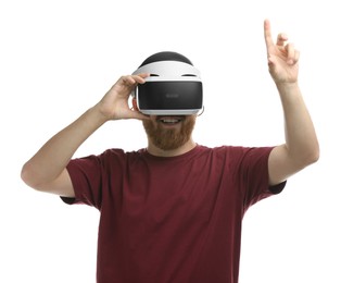 Smiling man using virtual reality headset on white background