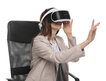 Photo of Smiling woman using virtual reality headset while sitting in office chair on white background