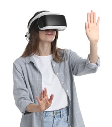 Photo of Smiling woman using virtual reality headset on white background