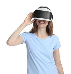 Photo of Smiling woman using virtual reality headset on white background