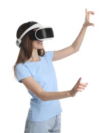 Photo of Smiling woman using virtual reality headset on white background