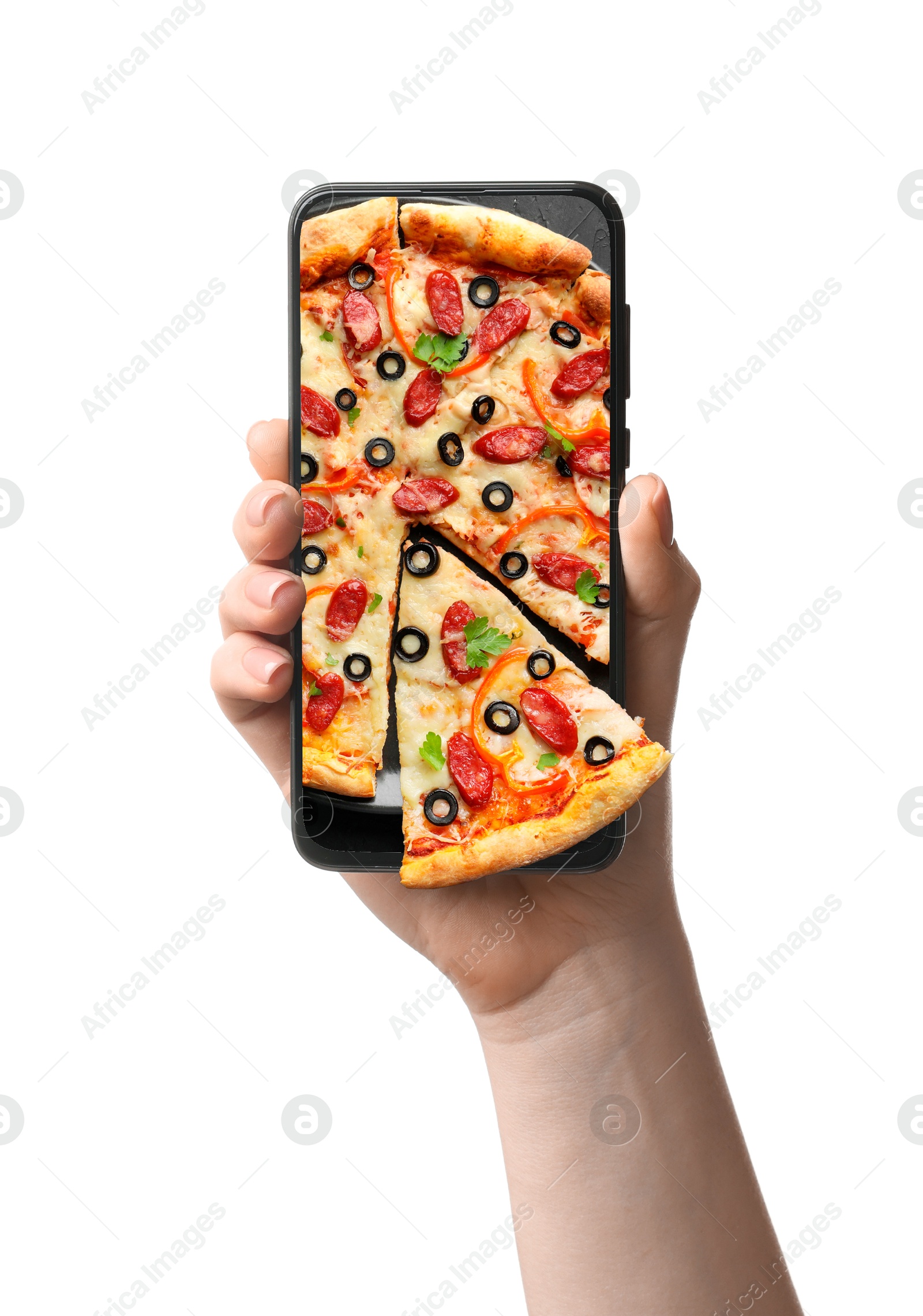 Image of Online food ordering. Woman holding smartphone with pizza on screen against white background, closeup. One slice sticking out of device