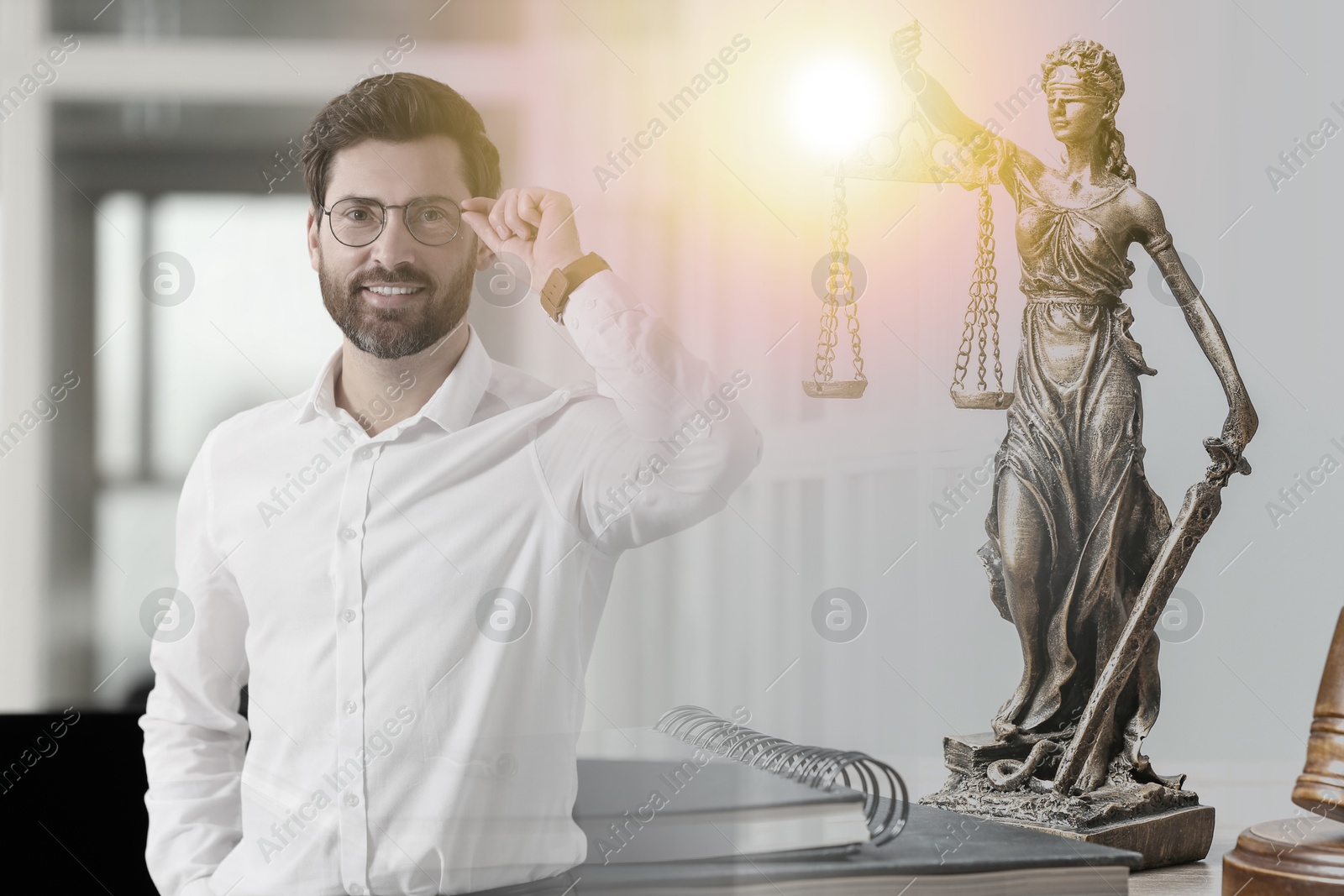 Image of Double exposure of lawyer and Lady Justice figure