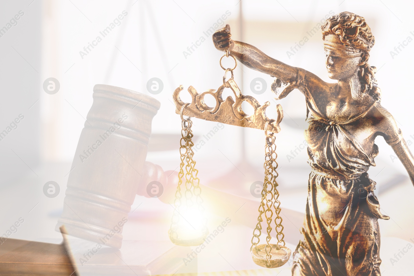 Image of Law. Double exposure of Lady Justice figure and gavel