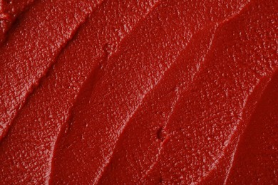 Texture of ketchup as background, top view. Tomato sauce