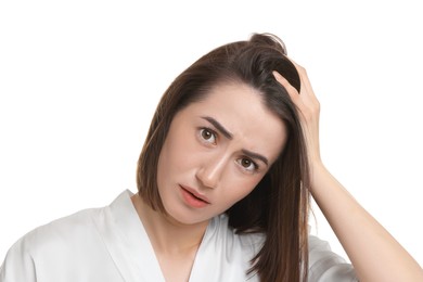 Stressed woman with hair loss problem on white background