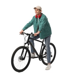 Smiling man with headphones on bicycle against white background