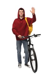 Smiling man with bicycle isolated on white