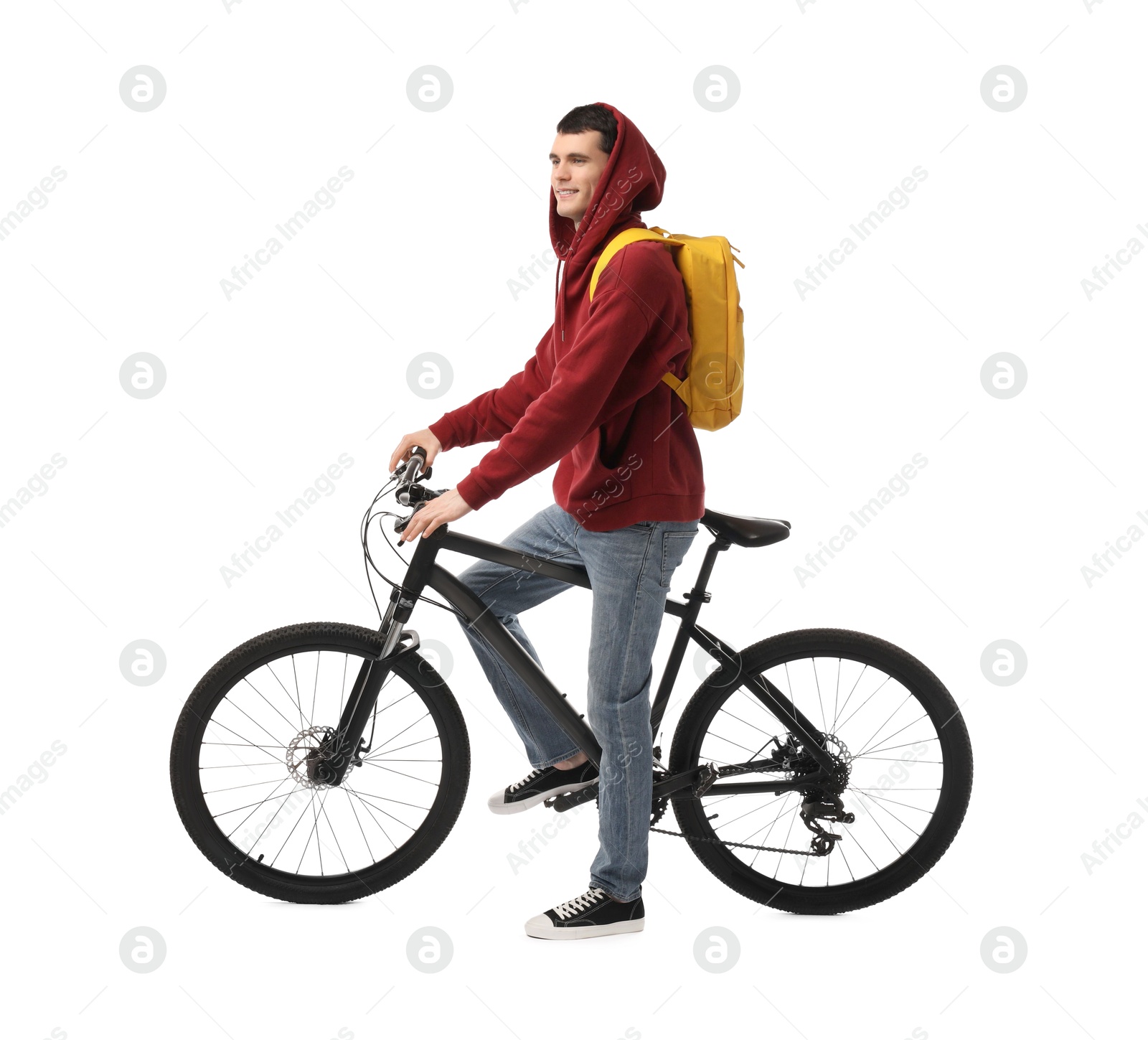 Photo of Smiling man with bicycle isolated on white