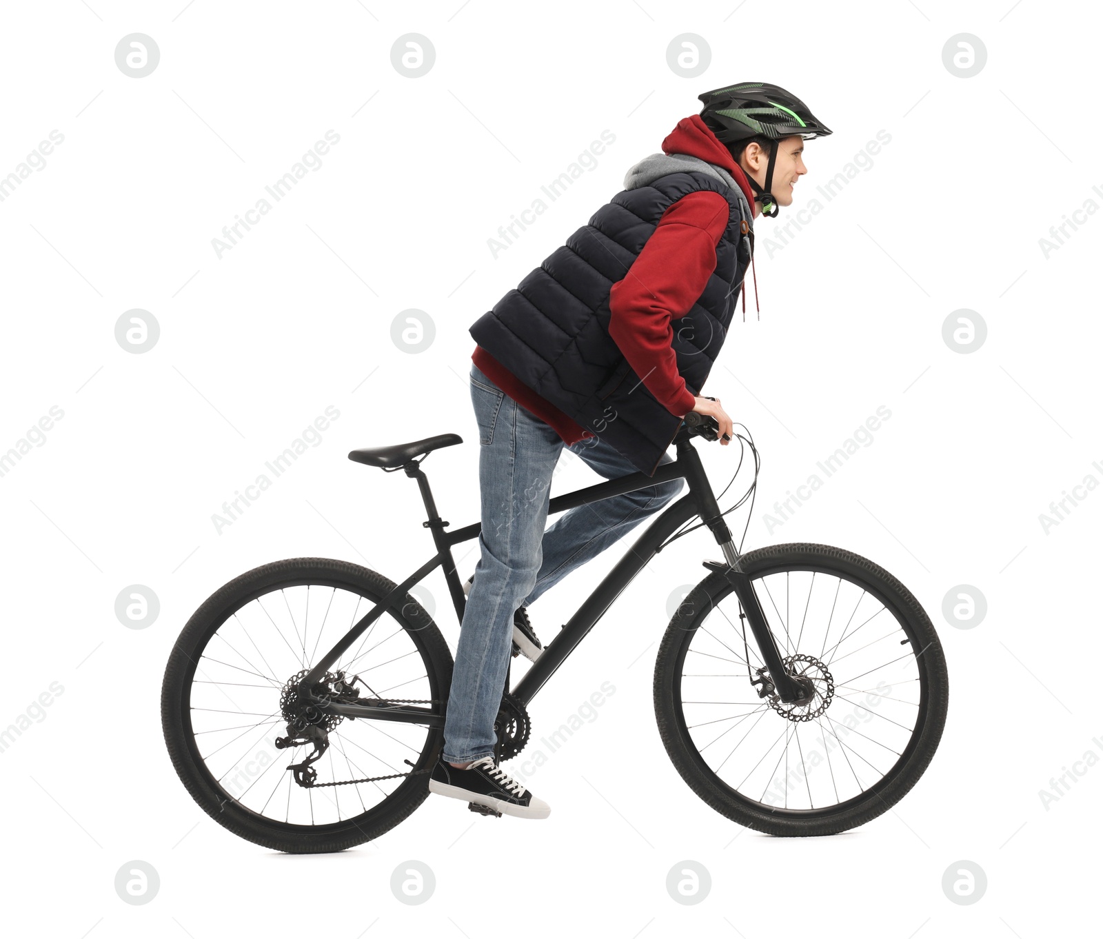 Photo of Man in helmet riding bicycle on white background