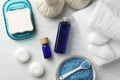 Photo of Flat lay composition with spa products on light wooden table