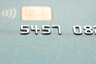 Photo of Plastic credit card as background, macro view