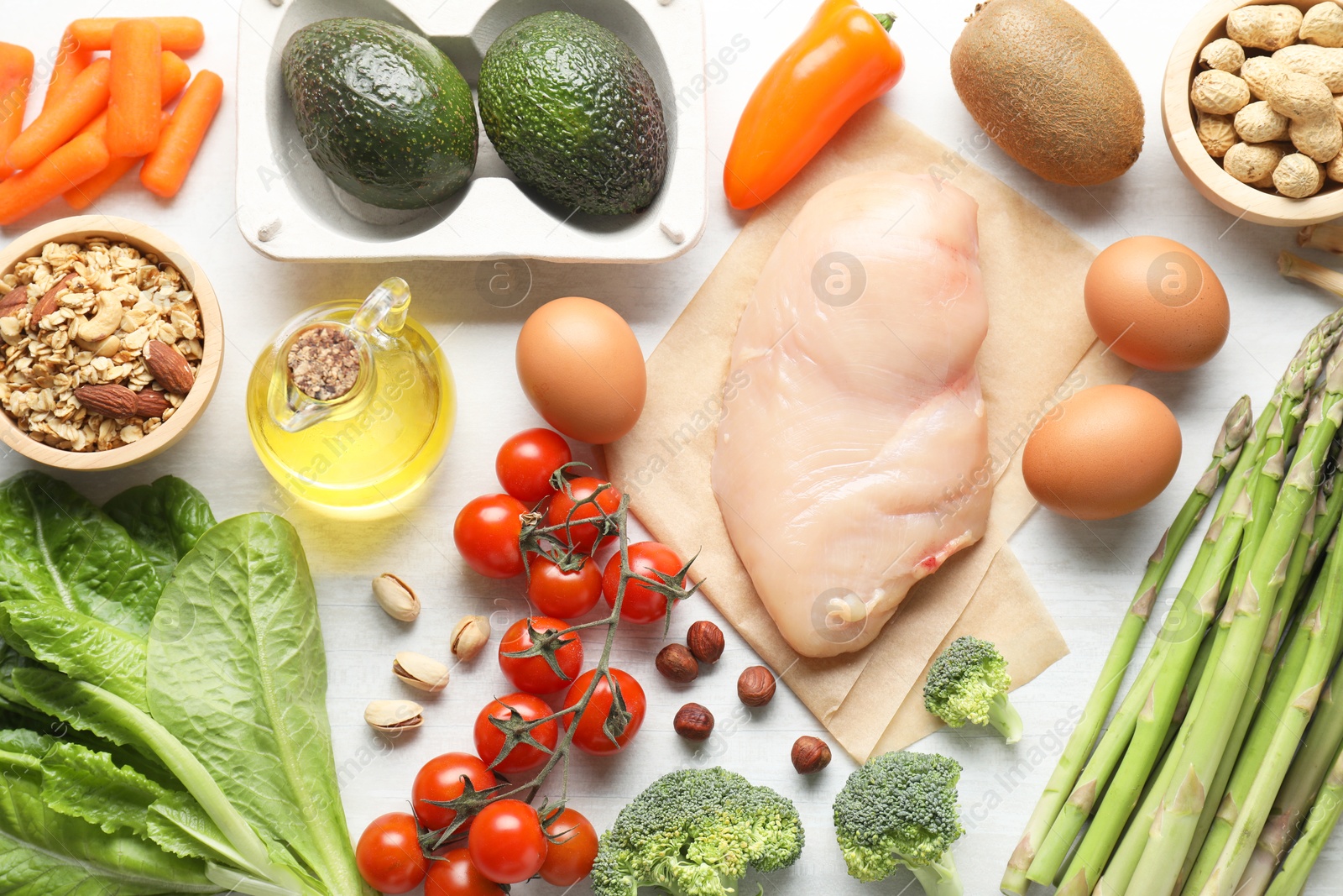 Many different healthy food on white wooden table, flat lay Photo of Many different healthy food on white wooden table, flat lay