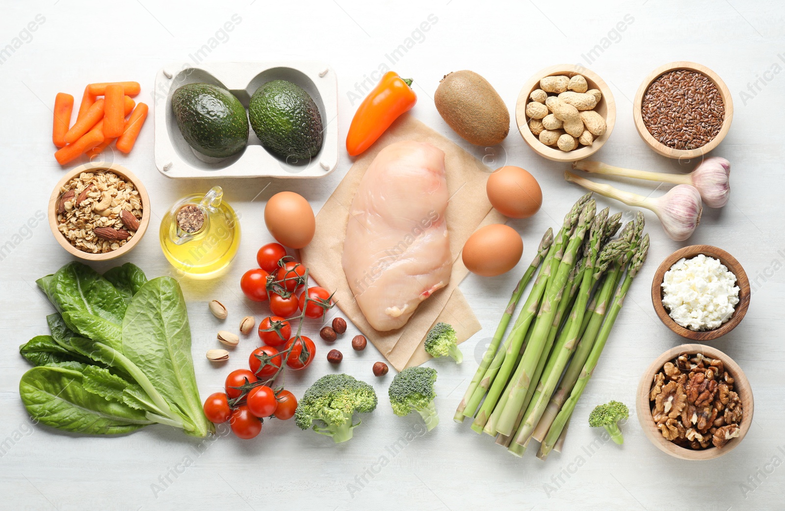 Photo of Many different healthy food on white wooden table, flat lay