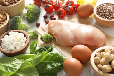 Photo of Many different healthy food on table, closeup