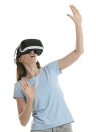 Surprised woman using virtual reality headset on white background