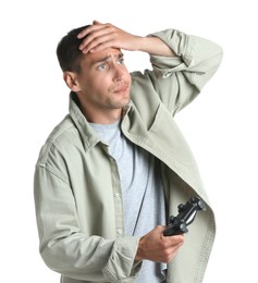 Unhappy man with controller on white background