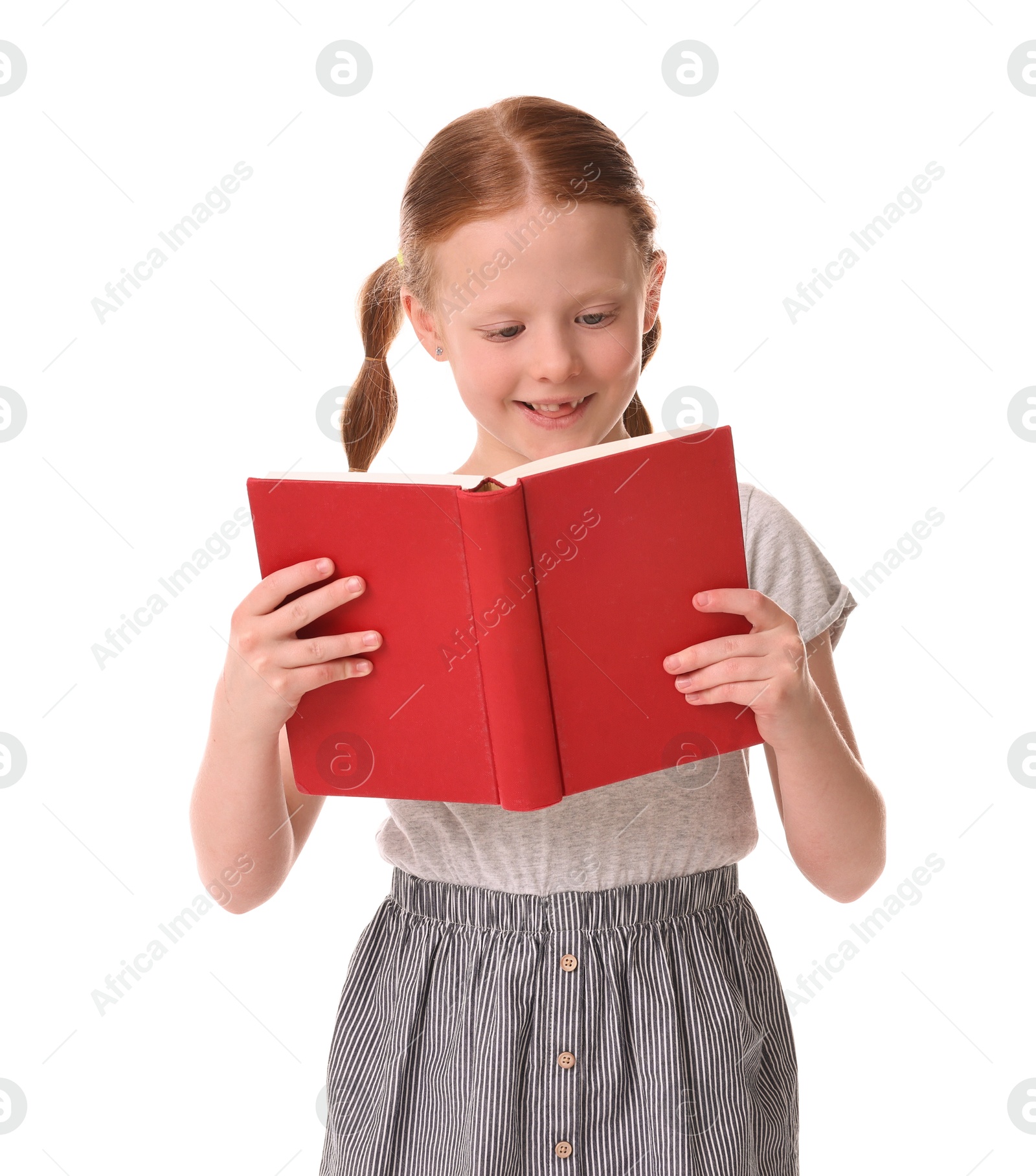 Photo of Smiling girl reading book on white background