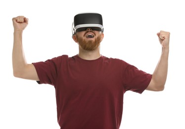 Photo of Emotional man using virtual reality headset on white background