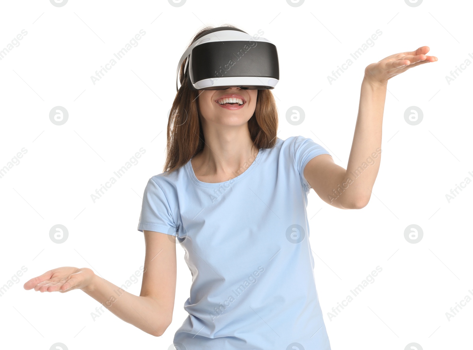 Photo of Smiling woman using virtual reality headset on white background