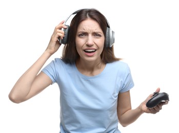 Photo of Surprised woman with game controller on white background