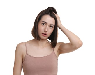Sad woman with hair loss problem on white background