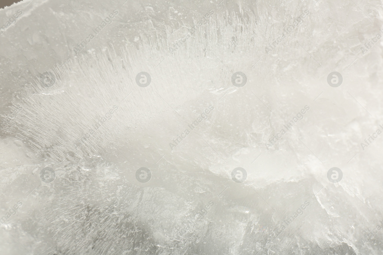 Photo of Crystal clear ice as background, closeup view