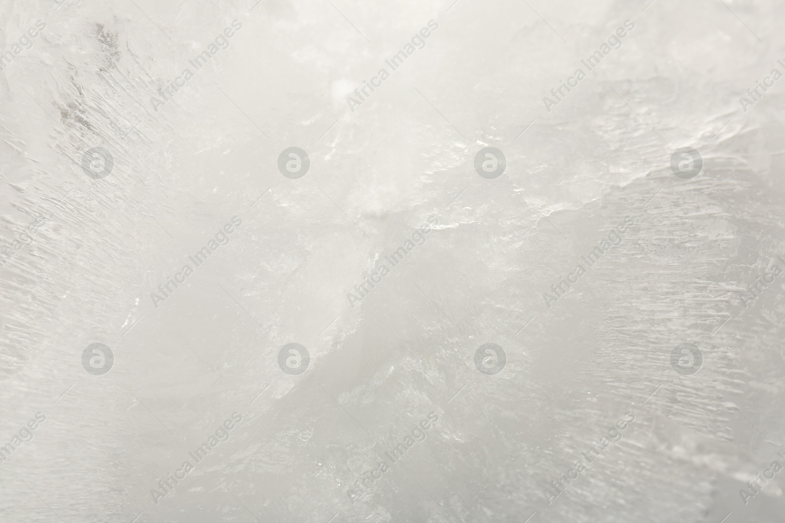 Photo of Crystal clear ice as background, closeup view