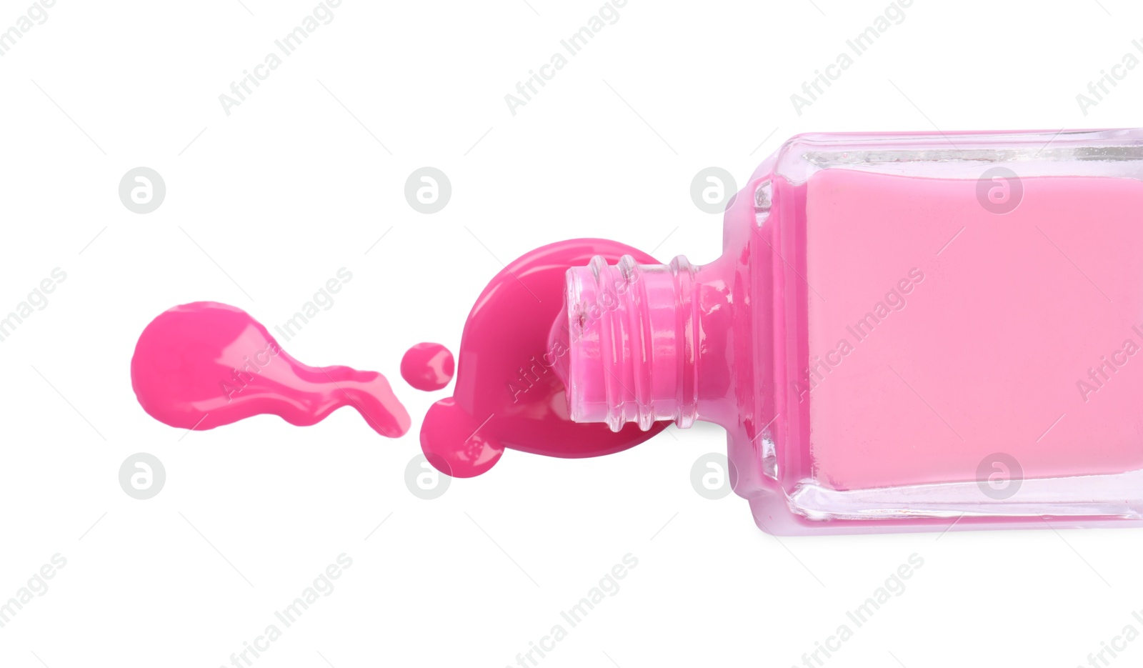 Photo of Bottle and spilled pink nail polish isolated on white, top view