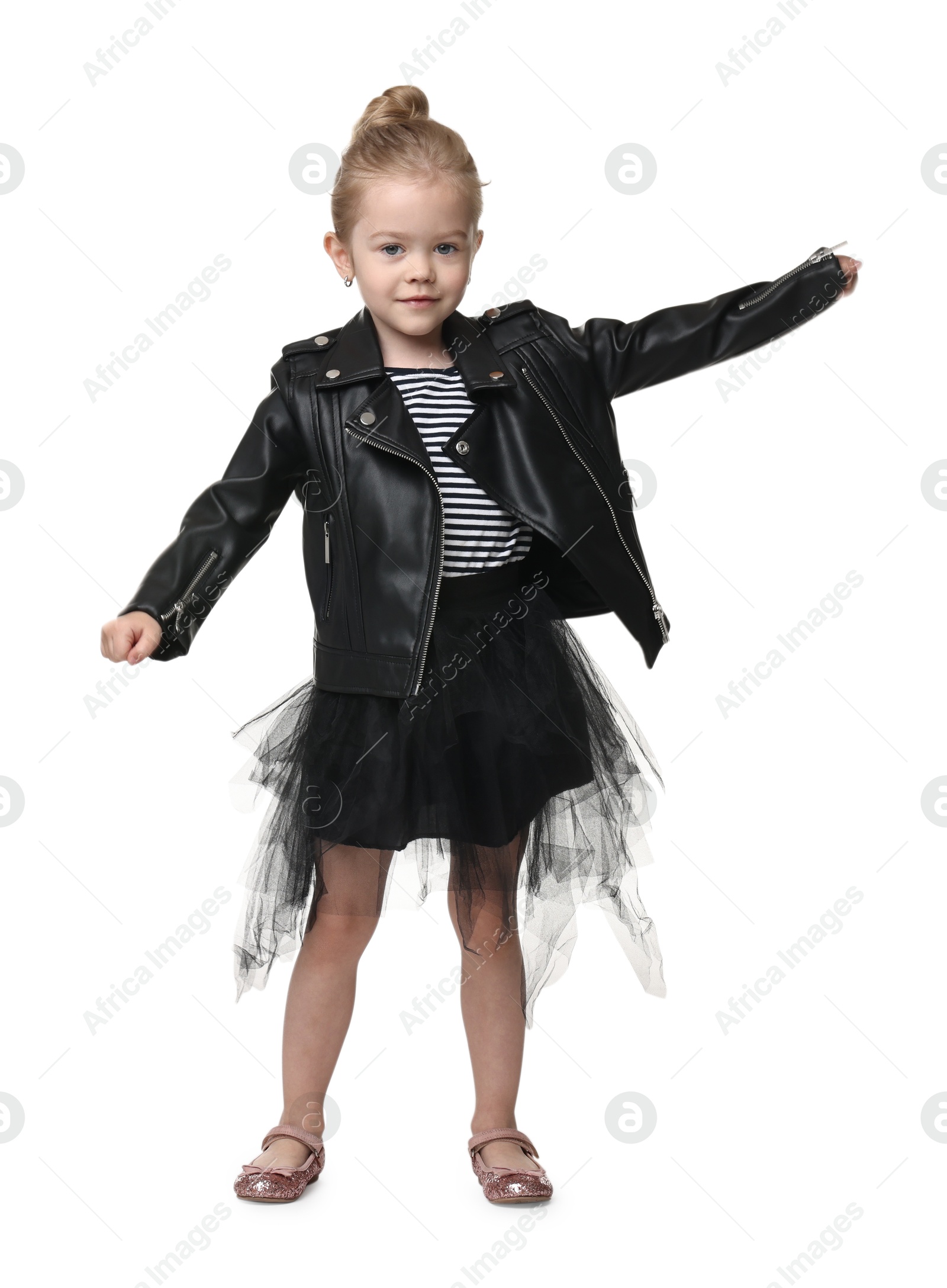 Photo of Cute little girl dancing on white background