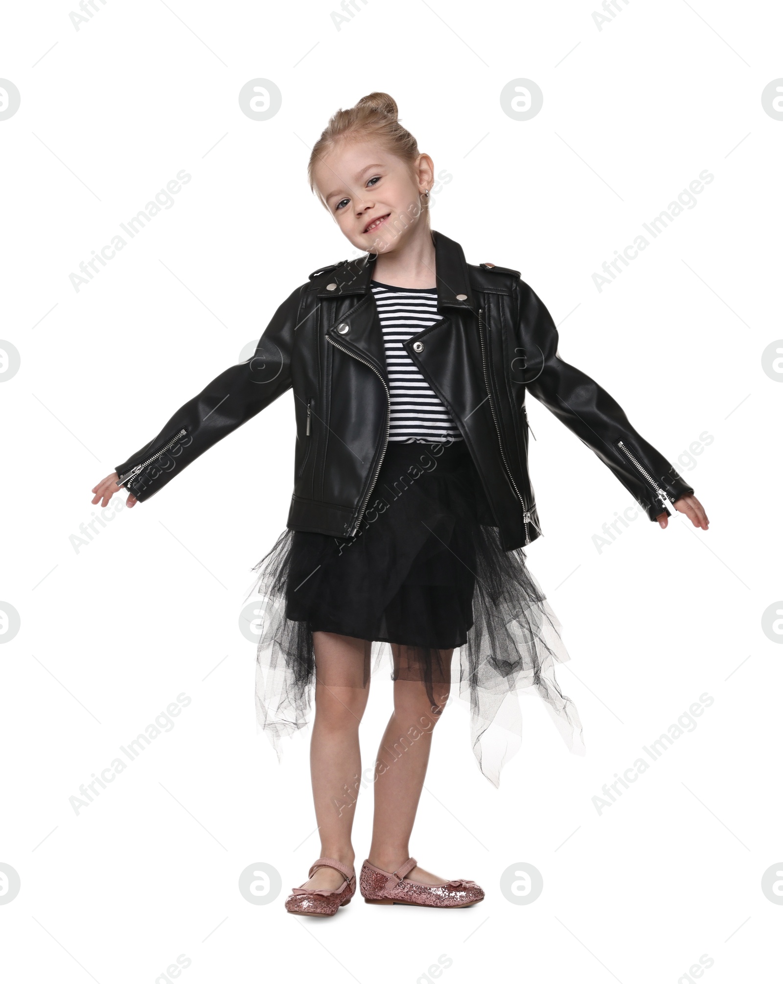 Photo of Cute little girl dancing on white background