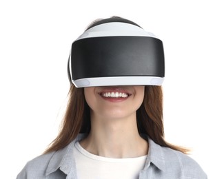 Photo of Smiling woman using virtual reality headset on white background