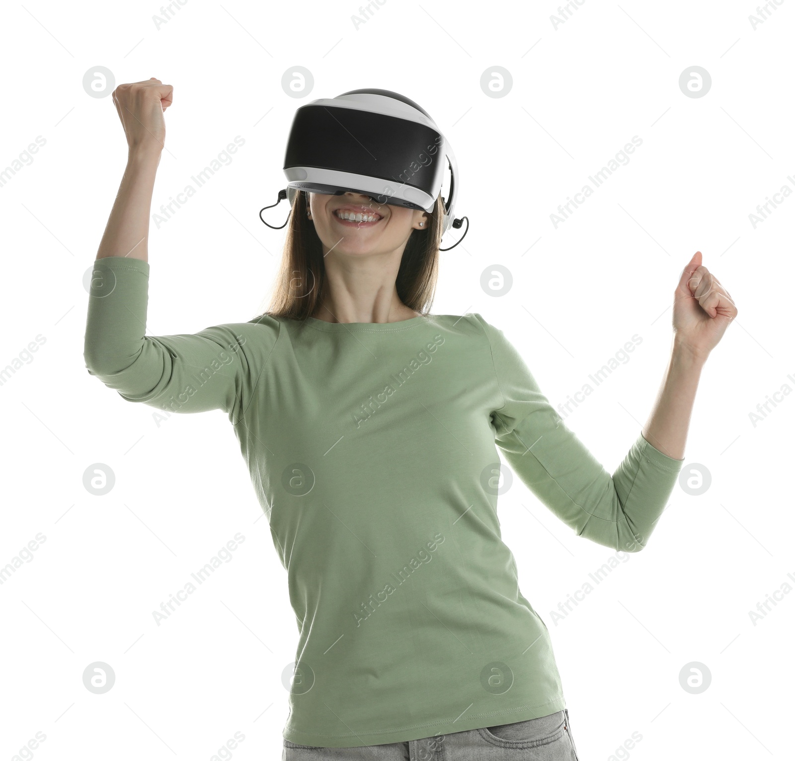 Photo of Smiling woman using virtual reality headset on white background