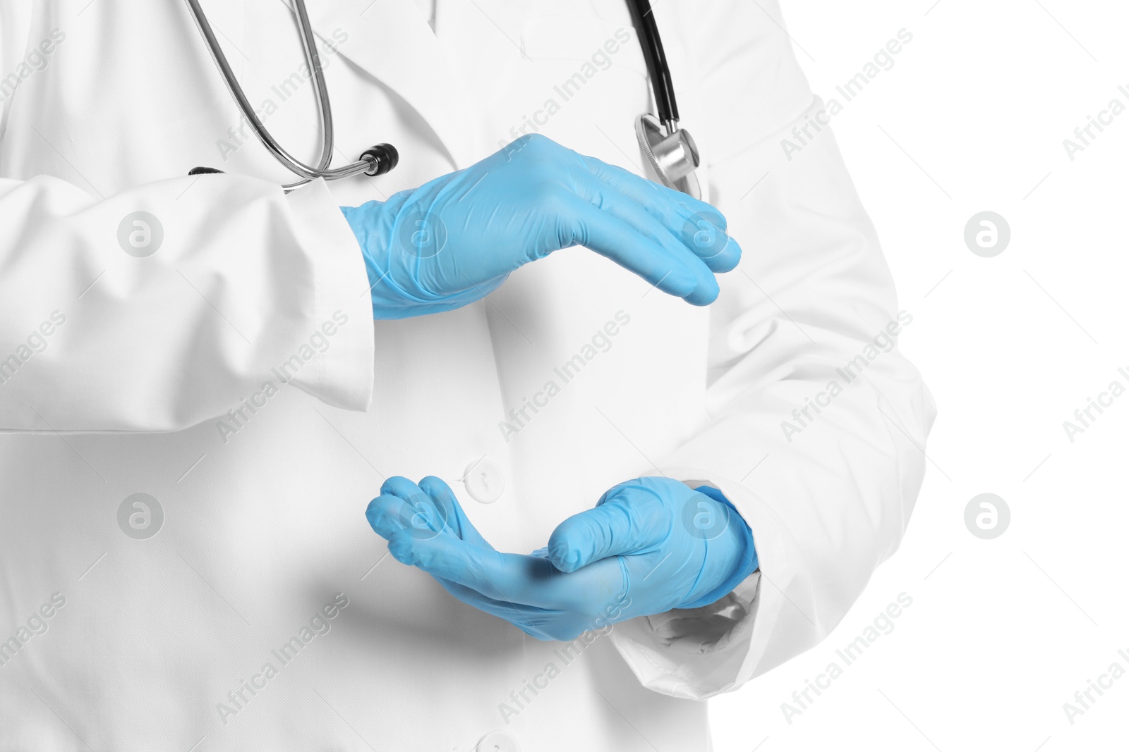 Photo of Doctor holding something on white background, closeup