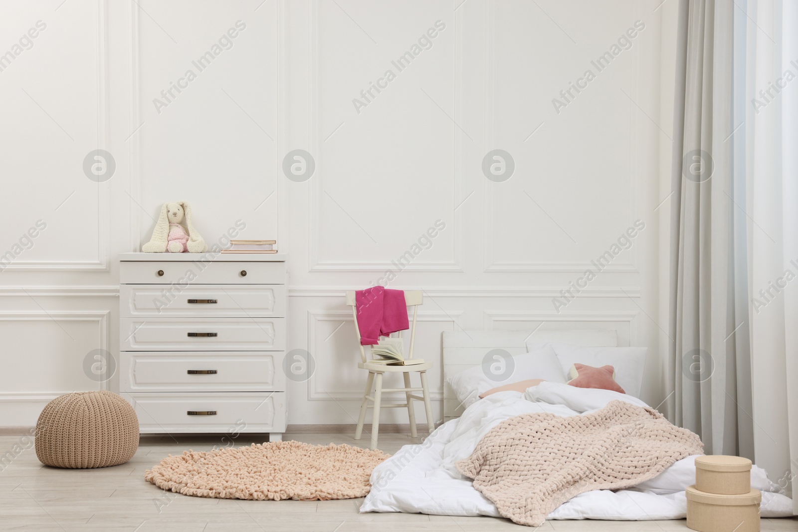 Photo of Cute child's room interior with modern furniture