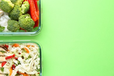 Photo of Healthy food. Different meals in glass containers on green background, top view. Space for text